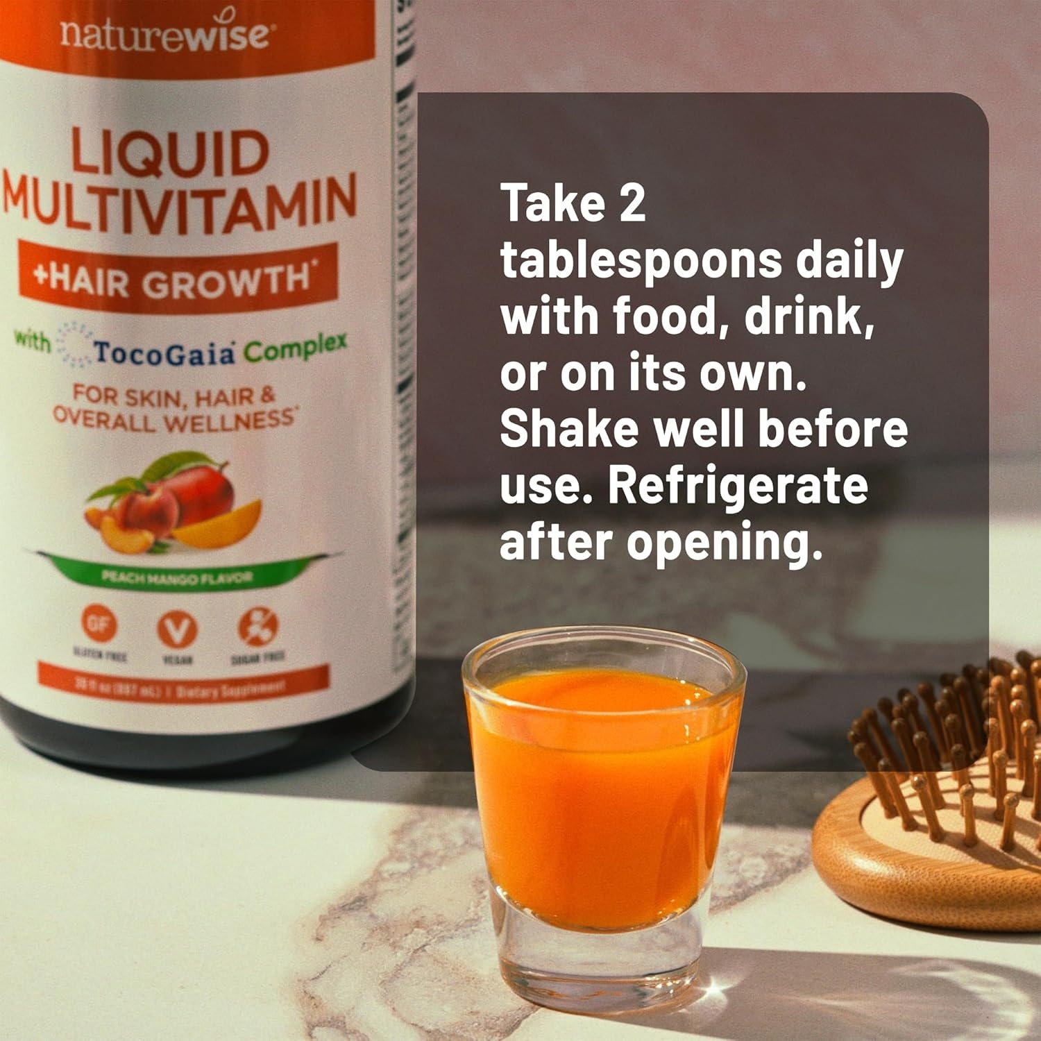 image:imageNatureWise Liquid Multivitamin Hair Growth for Women amp Men Tocogaia for Hair Growth amp Skin Elasticity Support Biotin Vitamin D E B Sugar Free Multivitamin Vegan 30 fl oz30 ServingsPeach Mango